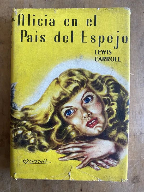Alicia en el pais del espejo - Lewis, Carroll (ñ3)