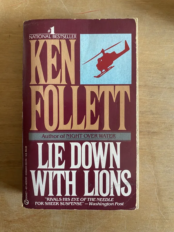 Lie down with lions - Follett, Ken (3n5)